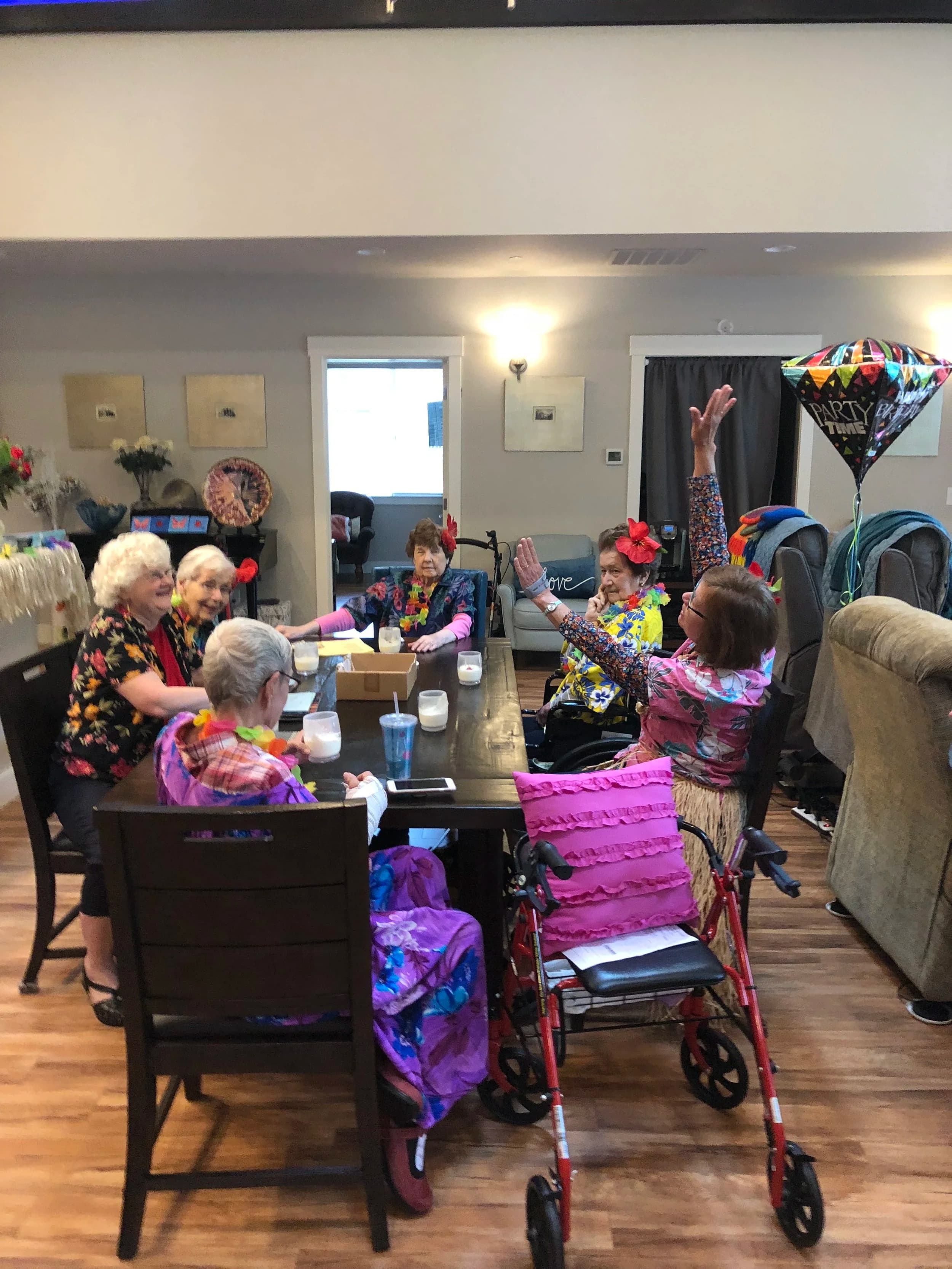 Residents sharing an activity at Kenmore Retreat
